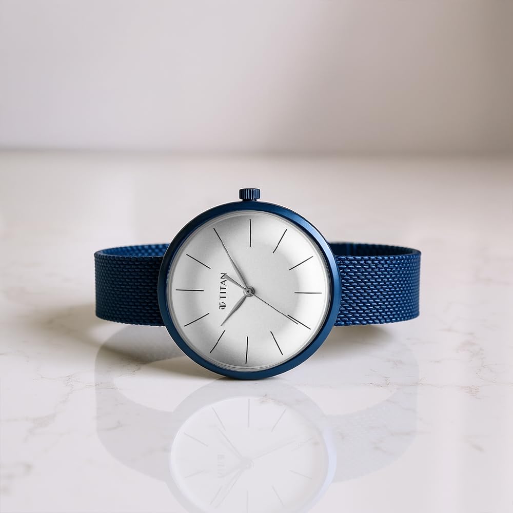 Titan Slimline Quartz Analog White Dial Blue Stainless Steel Strap Watch for Women