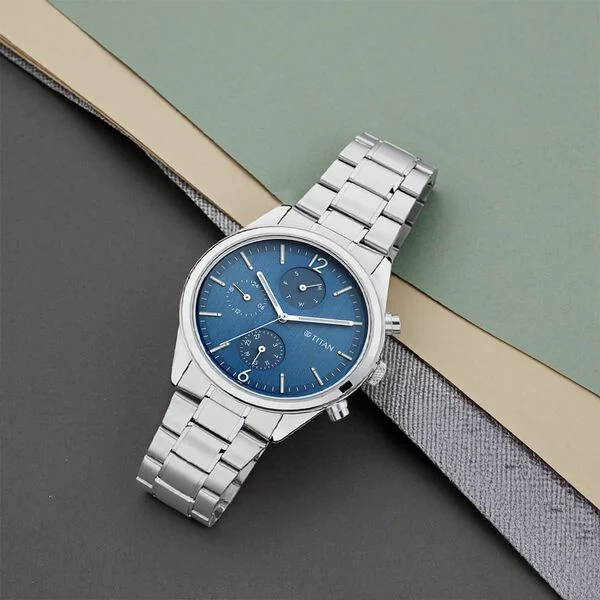 Titan Men's Metropolitan Charm: Men's Multifunctional Blue Watch with Metallic Accents